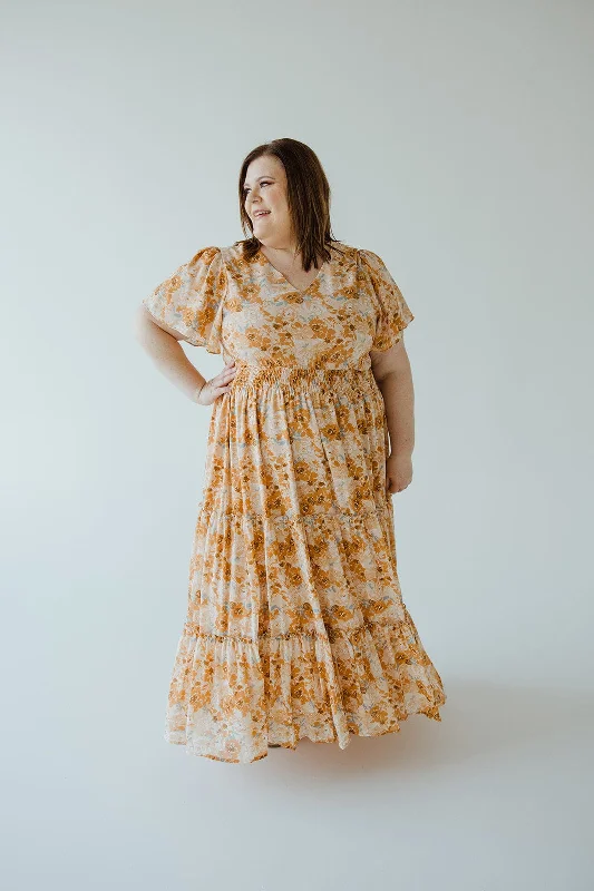 TIERED FLUTTER SLEEVE FLORAL DRESS IN AMBER SUNSET