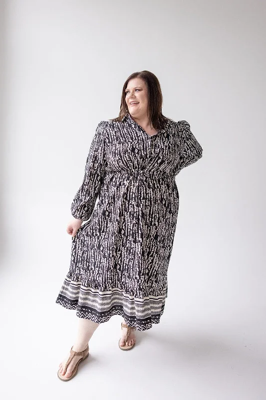 TEXTURED DRESS WITH RUFFLE HEM
