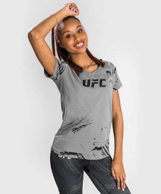 UFC Venum Authentic Fight Week 2.0 Women’s Short Sleeve T-Shirt - Grey Collared T-Shirt Boat Neck A-Line UFC Venum Authentic Fight Week 2.0 Women’s Short Sleeve T-Shirt - Grey Collared T-Shirt Boat Neck A-Line